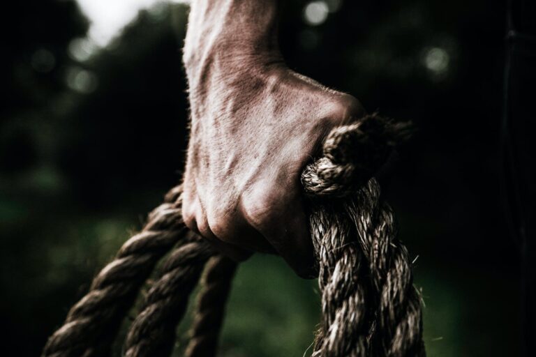 alt="hand grip of a rope"